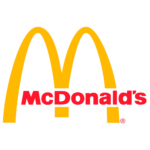 Het logo van McDonalds toont de iconische gele Golden Arches in een M-vorm boven het woord McDonalds in felrode tekst. Dit ontwerp wordt direct herkend en is officieel goedgekeurd door bedrijven over de hele wereld.